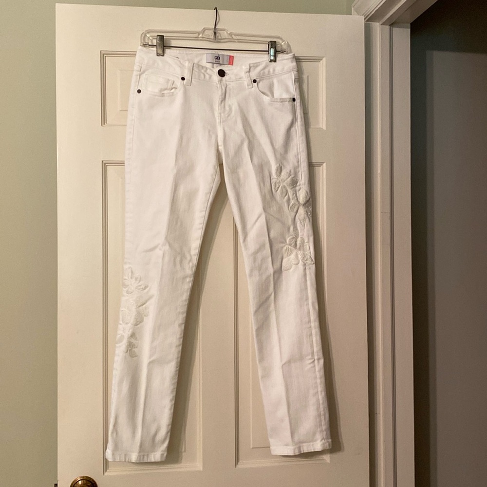 CAbi white slim boyfriend jeans with embroidered legs. Size 2.